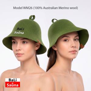 Two women model oversized green felt hats with a BaLi Sauna logo in an advertising product photo (Merino wool).